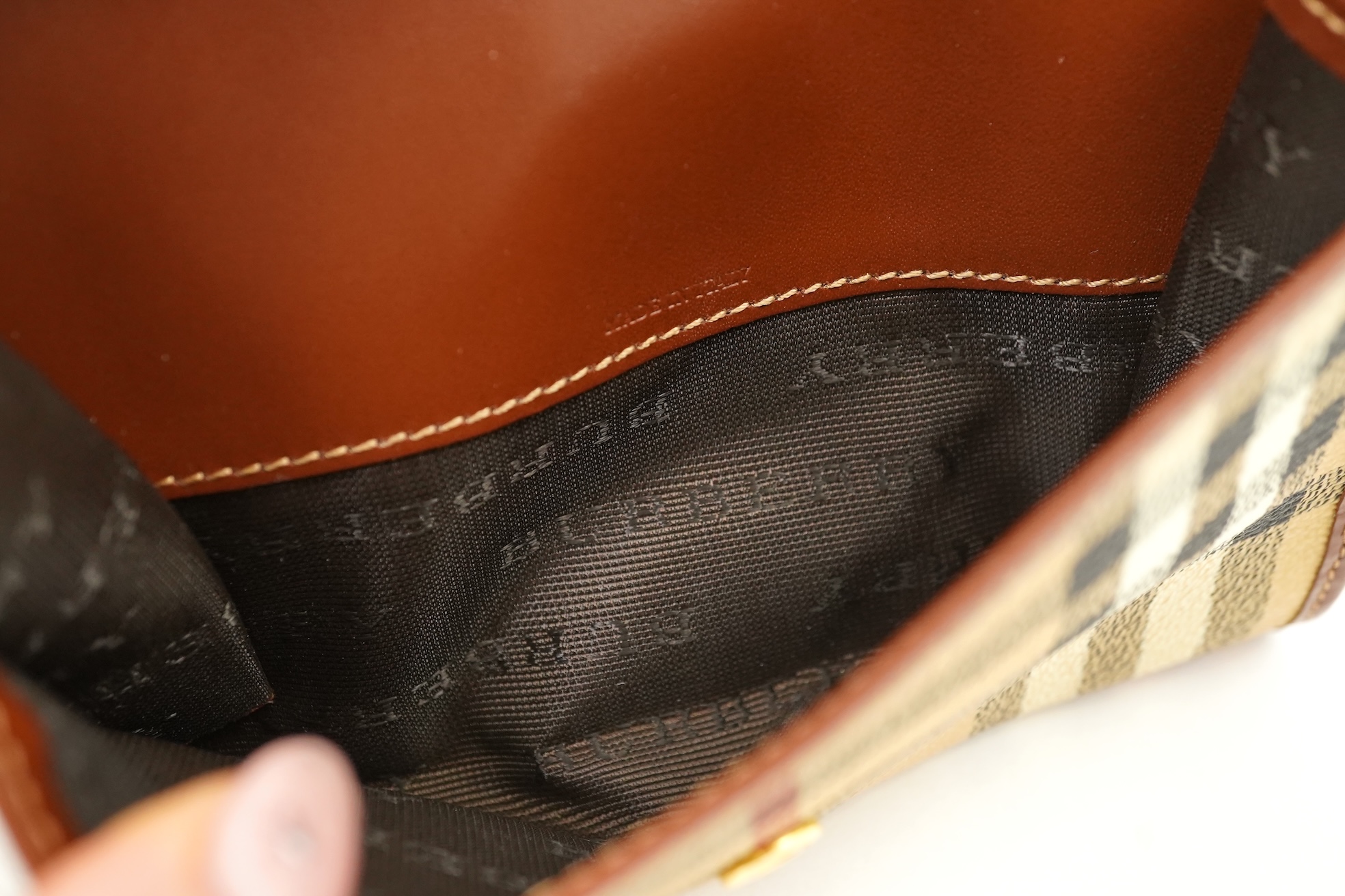 A Burberry brown tartan scarf, sunglasses with case and wallet with original box.